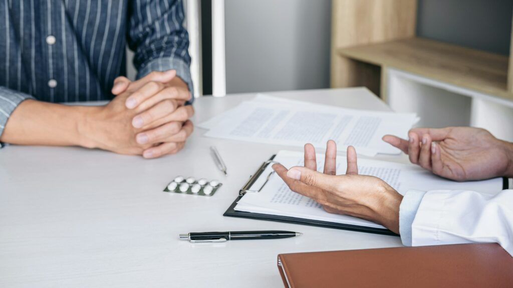 Doctor presenting report of diagnosis, symptom of disease and re